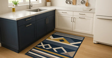 Farmhouse kitchen sink area styled with a washable 2x8 runner rug