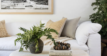 A luxurious wool rug enhancing a cozy, modern living room with timeless texture and natural warmth.