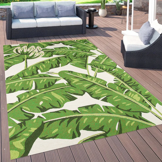 Modern 5x7 area rug styled under a living room coffee table with neutral decor