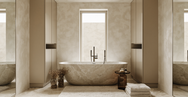 Machine washable bathroom rug beside a freestanding tub