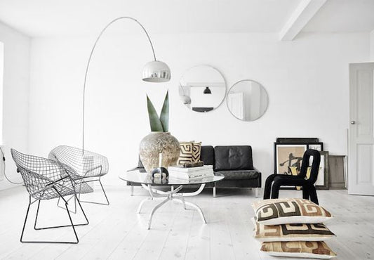 Scandinavian rug in a minimalist living room with neutral tones and wooden decor