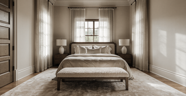 9x12 rug under a king bed in a master bedroom with 18-24 inch clearance on each side
