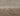 Natural Wool area rug 2' X 3' - styled in a bedroom
