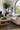 Brown area rug 2'6" X 8 - styled in a living room