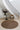 Brown area rug 2'6" X 8 - styled in a bedroom