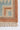 Red area rug 2' X 3' - overhead flat lay view