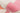 Pink area rug 9' X 12' - styled in a bedroom