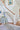 Blue Polyester area rug 5' X 7' - styled in a bedroom