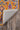 Orange Oriental area rug 5' X 8' - corner detail and border