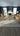 Blue Polyester area rug 5'3" X 7 - styled in a living room