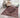Red Polyester area rug 5' X 8' - styled in a dining room