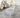 Grey area rug 2 2' X 3 - styled in a dining room