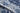 Blue Polyester area rug 8' X 10' - styled in a bedroom