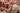 Red area rug 2' X 3' - styled in a bedroom