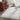 Grey Contemporary area rug 9' X 12' - styled in a dining room