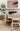 Natural Stripe area rug 5' X 8' - styled in a bedroom