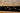 Black area rug 5'9" X 5 - close-up of pattern and texture