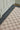 Grey area rug 27 2'7 - corner detail and border