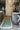 Green Contemporary area rug 3'6" X 5 - styled in a bedroom