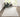 Grey area rug 2' X 3' - styled in a dining room