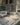 Grey Polypropylene area rug 3'11" X 5 - styled in a living room