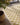 Beige area rug 8' X 10' - overhead flat lay view