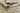 Beige area rug 6'3" X 9 - styled in a dining room