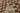 Brown Contemporary area rug 2'6" X 8 - styled in a dining room