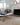 Beige Contemporary area rug 2'6" X 8 - styled in a bedroom