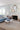 Beige area rug 7'9" X 9 - styled in a living room
