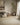 Ivory area rug 5'3" X 7 - styled in a living room