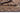 ORC-1 Orchard Ripple jute wool rug featuring slate, natural, and brown stripes.