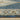 Oriental Weavers Andorra 2430A Blue and Gold Compact Bedroom Accent Polypropylene Area Rug - 3'3" x 5'2"