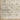 Oriental Weavers Avalon AVA05 Beige and Gray Medium Living Room Rug Polyester Area Rug 5'3" x 7'10" β folded corner showing the backing