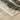Oriental Weavers Bauer 8120D Beige and Charcoal Medium Living Room Rug Modern Area Rug 5'3" x 7'6" β corner detail and edge binding