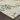 Oriental Weavers Bowen Grey 108W2 Gray and Gold Medium Living Room Rug Floral Area Rug 5'3" x 7'6" β corner detail and edge binding