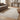 Oriental Weavers Branigan BRG07 Ivory and Brown Small Entryway Accent Modern Area Rug 2'3" x 3' β styled in a room, second angle