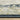 Oriental Weavers Branson BR05A Teal Blue and Ivory Compact Bedroom Accent Polypropylene Area Rug 3'3" x 5' β pile height and yarn texture close-up