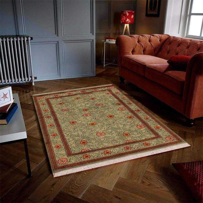 Elegant 8x10 Persian rug with intricate patterns laid under a living room sofa set, adding warmth and traditional charm