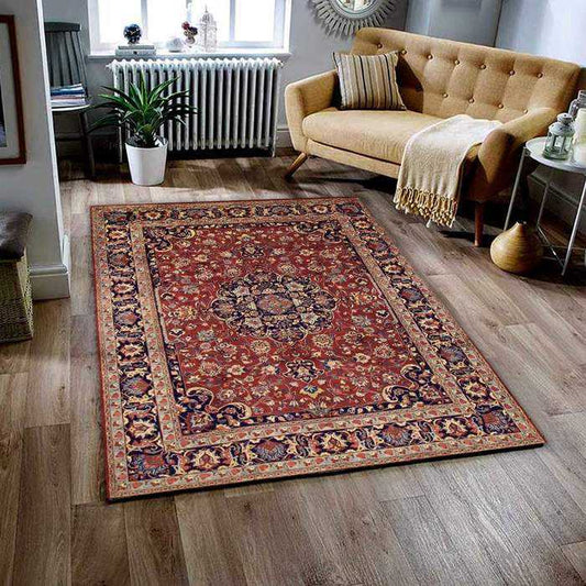 Vintage Persian rug with traditional patterns and rich colors displayed in a classic living room with antique furniture