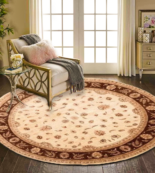 Dining area with a 48" round table centered on a perfectly sized 6' round rug in a modern, well-lit room