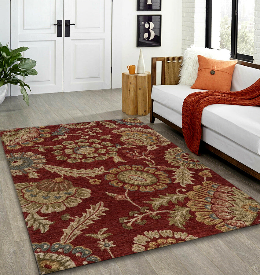 Traditional area rug with a medallion pattern styled in a cozy 2025 living room with vintage furniture and neutral tones