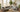 Stylish living room featuring an 8x10 rug under a sofa and coffee table, illustrating 2025 rug size, style, and smart buying tips.