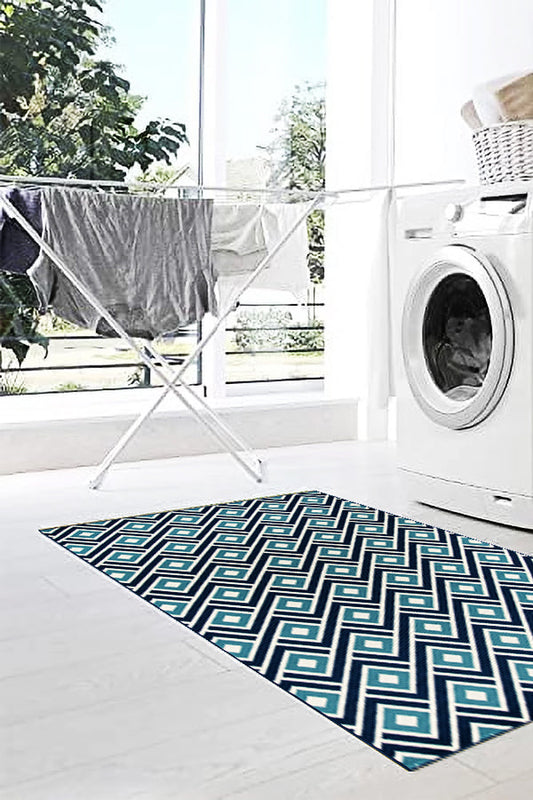 A stylish, washable blue and white runner rug in a modern laundry room.