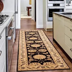Modern kitchen with a stylish runner rug placed between the island and counter, adding warmth and functionality