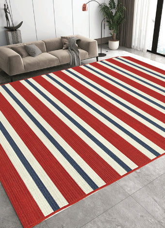 Nautical runner rug with navy and white stripes placed in a beach-style hallway with natural light and coastal decor
