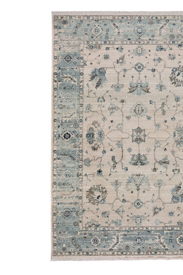 Landis-Ushak Ivory Blue Area Rug