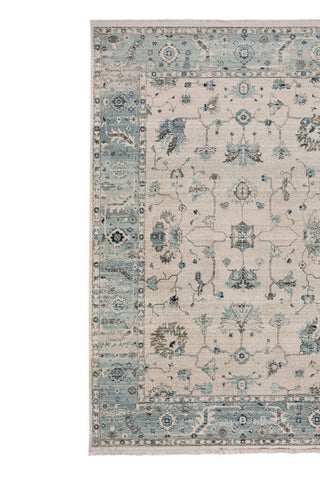 Landis-Ushak Ivory Blue Area Rug
