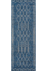 Moroccan-inspired Novogratz rug styled in bohemian dining space