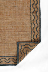 Handcrafted jute and wool rug in neutral slate and brown palette, Orchard Ripple.
